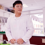 Abbey College Cambridge Male Student Working In Science Lab