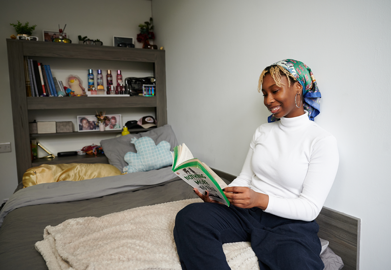 Female Student Reading On Her Bed At Clydesdale House Abbey College Manchester