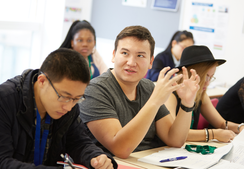 Male Student In Business Class At Abbey College Cambridge