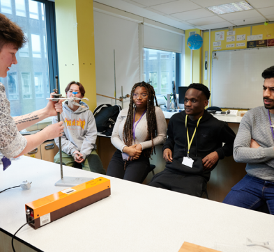 Teacher Demonstrating To Students In Foundation Science Class