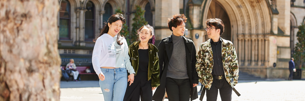 Hong Kong Students Walking In Manchester City Centre