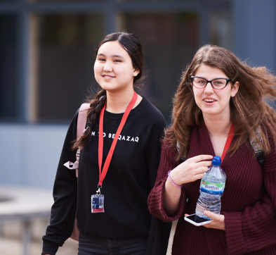 Students Walk Across The Courtyard Between Lessons At Abbey College Cambridge