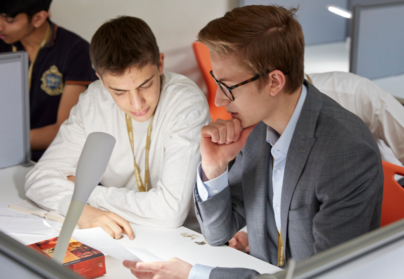 Foundation Students Working Together In The College Library