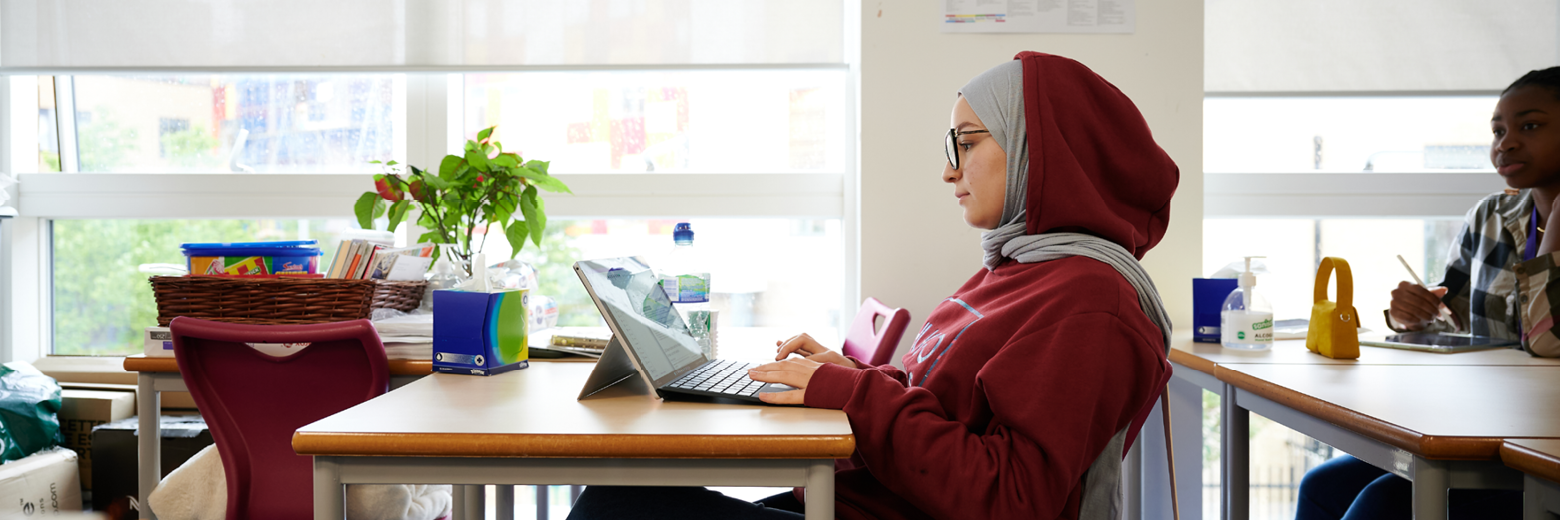 Female Student In Business Class At Abbey College Cambridge